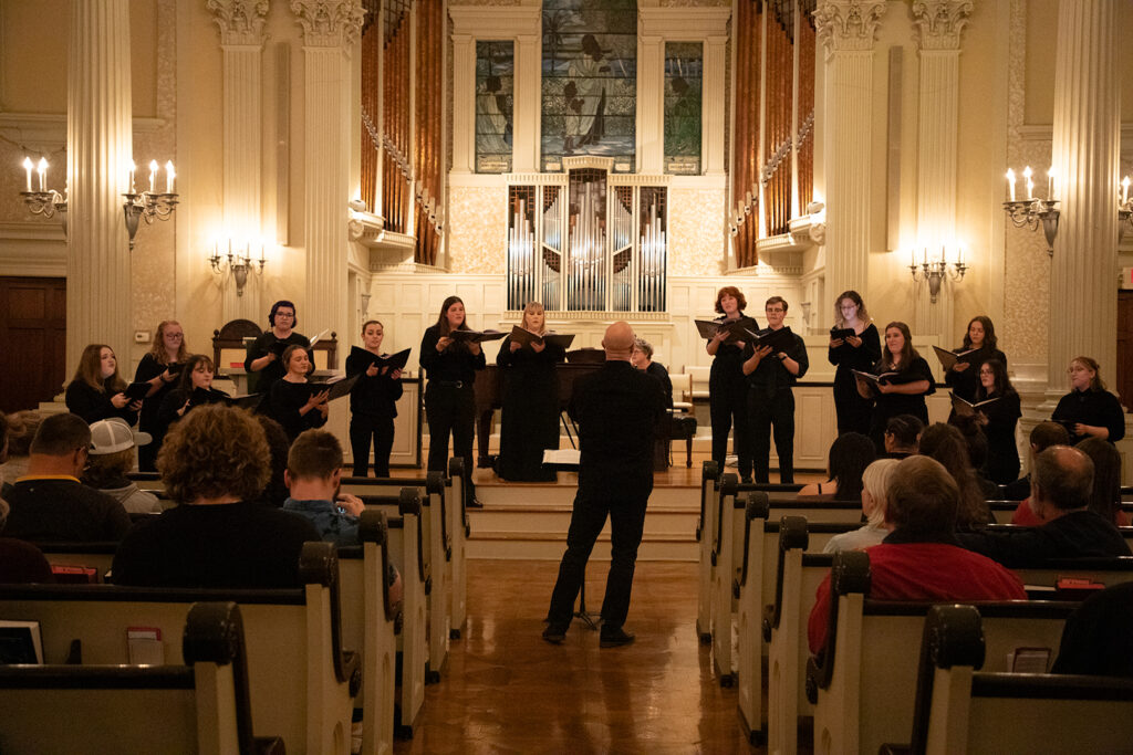 Paul Dease conducting the Chamber Choir in concert, fall 2023.